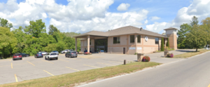 YMCA Brighton building with parking lot and main entrance